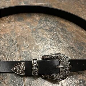 Black belt with silver buckle